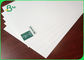 کاغذ 1.5 / 1.35mm کاغذ کاغذی الیگا ضخامت براق صاف سفید کارتن برای بسته بندی